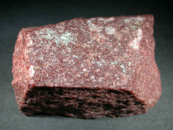 Not really a mineral but a rock. This crimson red quartzite is quarried 